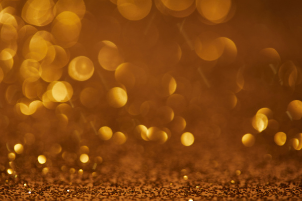 golden bokeh christmas background with glitter - Foto, imagen
