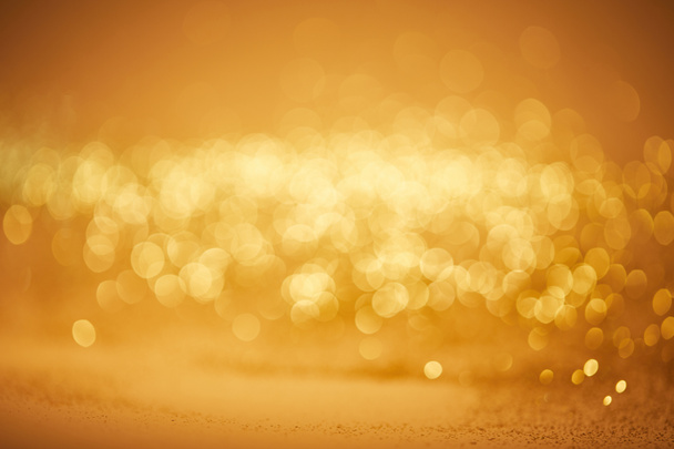 golden bokeh christmas background with glossing sequins - Φωτογραφία, εικόνα