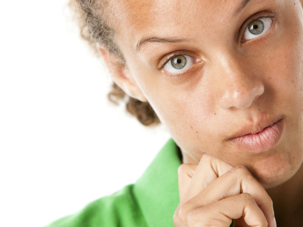 Mixed race teenage girl with thoughtful expression - Foto, Imagen