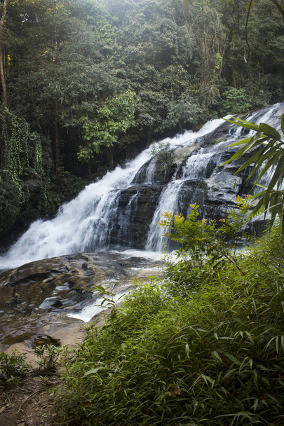 Long exposure of breathtaking waterfall in exotic Mae Klang Luang. Chiang Mai, Thailand. - Fotoğraf, Görsel