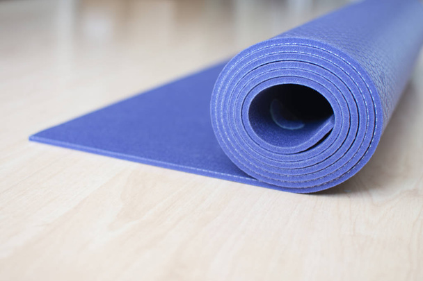 Yogamatte Hintergrund. Pilates Matte gesunde Bewegung Entspannungsmoment - Foto, Bild