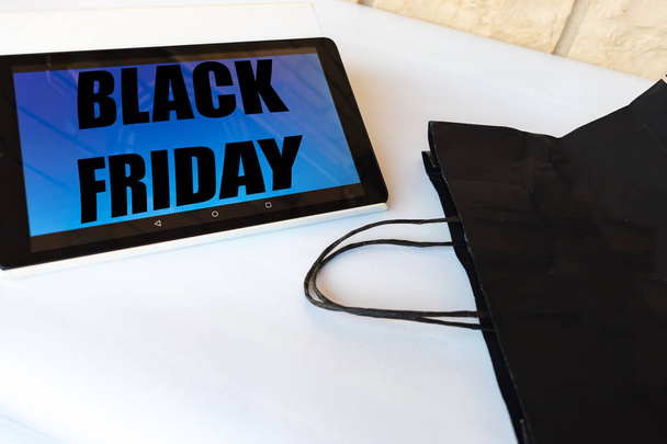Black friday shopping concept. Online shopping for the shopping party. - Fotó, kép