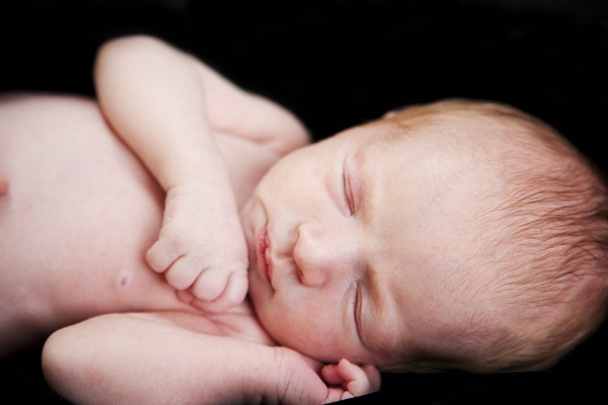 Sleeping newborn baby - Фото, изображение
