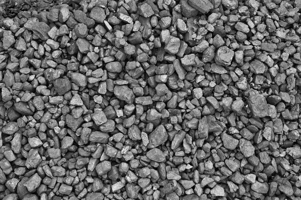 ein Haufen schwarzer Naturkohle, Foto des Kohlebergwerks Hintergrund, Textur - Foto, Bild