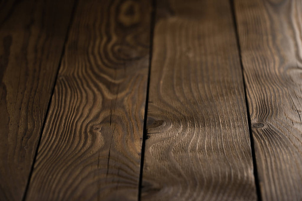 Old wooden plank background with selective focus. Wood Texture. - 写真・画像