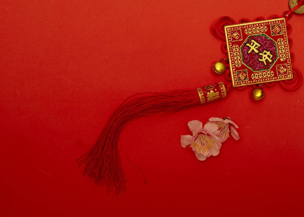 Chinese new year 2020 ornament on red paper with Chinese letter "FU" meaning meaning "fortune" or "good luck, gold ingot, Chinese lamp - Foto, Imagem