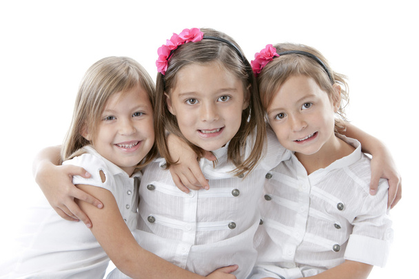 Coup de tête de trois petites filles souriantes
 - Photo, image
