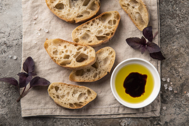 homemade italian ciabatta bread with olive oil and balsamic sauce, top view - Φωτογραφία, εικόνα