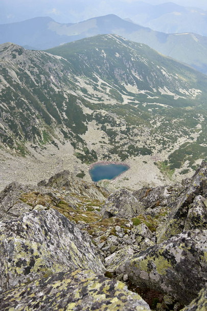 Landscape with a glacial lake in mountains - Foto, afbeelding