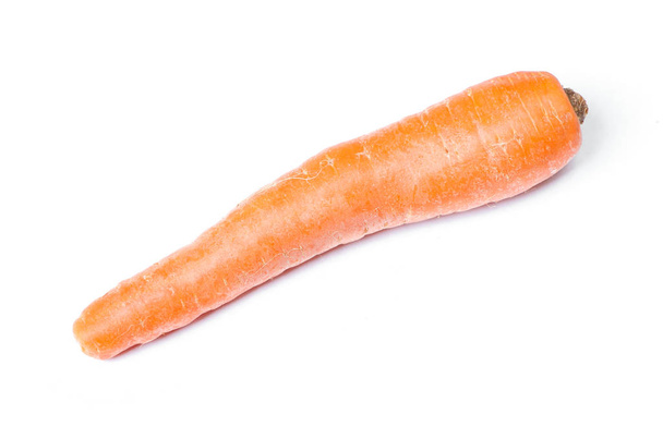 Single ugly carrot isolated on white background - Photo, image
