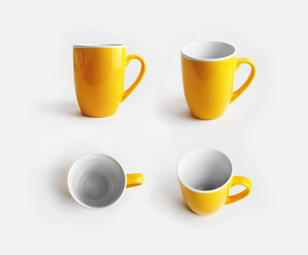 Tazas de cerámica amarilla. Tazas de café o té. maqueta de diseño sensible
. - Foto, imagen