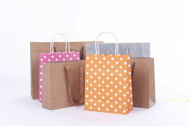 Colourful paper shopping bags isolated on white background. - Foto, Bild