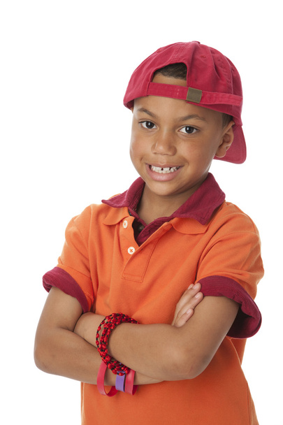 Mixed race caucasian little real boy wearing vibrant colorful clothes and cap - Foto, Bild