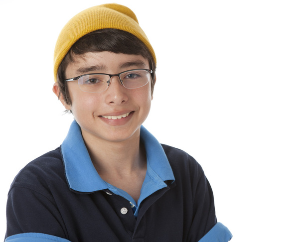 Real. Caucasian teenage boy wearing vibrant colorful clothes and a stocking cap - Фото, зображення