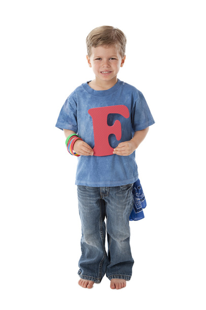 Human Alphabet. Caucasian little boy holds Letter F - Foto, afbeelding