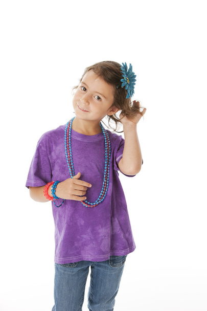 Real. Caucasian little girl styling or primping her hair and wearing lots of jewelry and accessories. - Foto, Bild