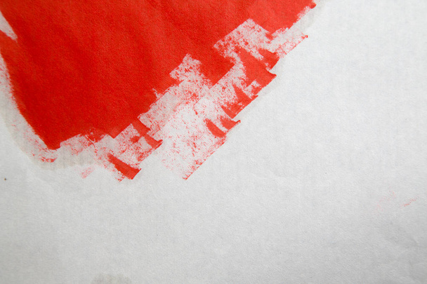 Big red grunge circle on old vintage paper/decorative stamps. Stylized symbol - Photo, Image