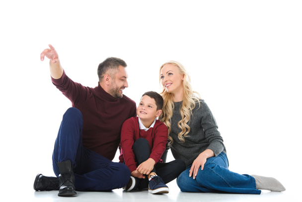 parents and son in autumn outfit, man showing something isolated on white - Photo, image