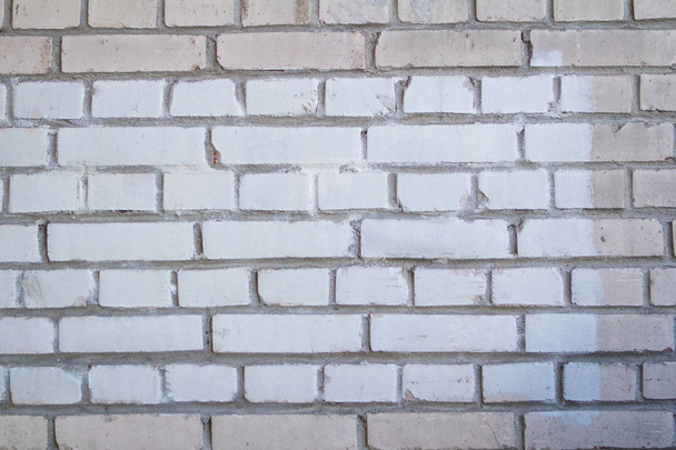 Textura de pared de ladrillo blanco utilizada para hacer el fondo adecuado para interiores y exteriores
. - Foto, Imagen