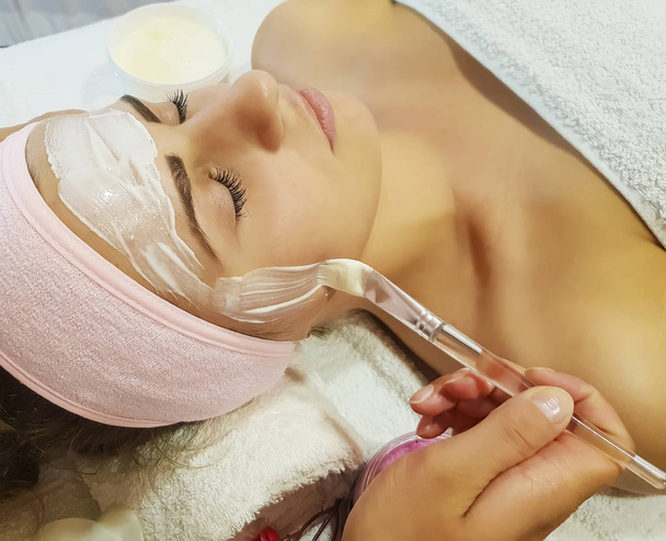 beautiful girl, mask cosmetic in spa salon procedure, relaxation - Photo, Image
