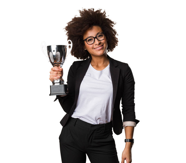 business black woman holding trophy - Fotoğraf, Görsel