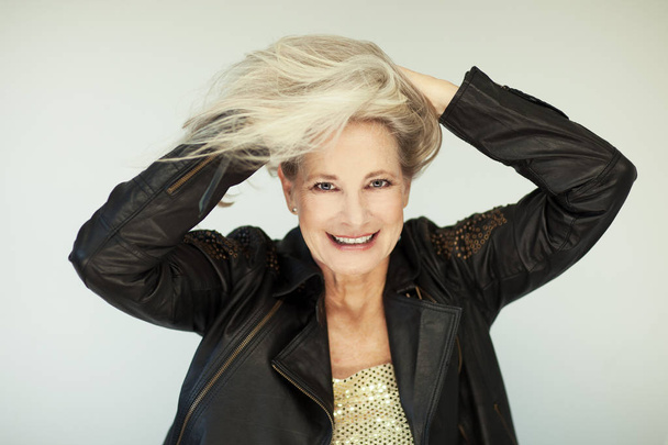stunning beautiful and self confident best aged woman with grey hair smiling into camera, portrait with white background - Φωτογραφία, εικόνα