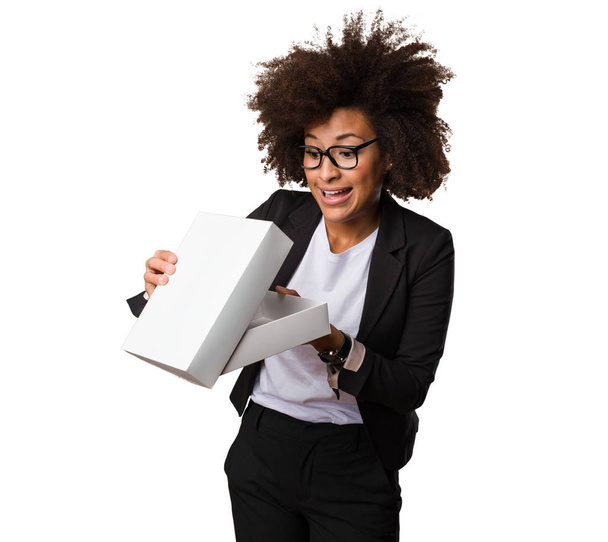 business black woman holding white box - Zdjęcie, obraz