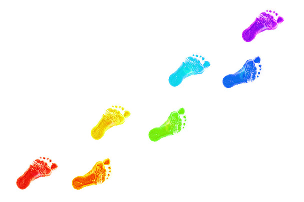 Baby foot prints all colors of the rainbow. - Valokuva, kuva
