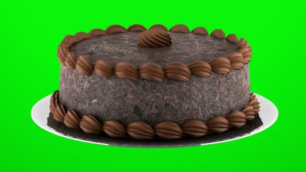 round chocolate cake loop rotate on green chromakey background - Footage, Video