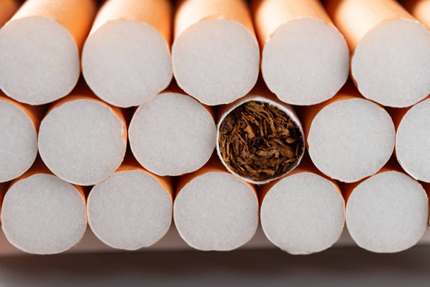 full box of cigarettes on grey background close up - Zdjęcie, obraz