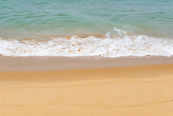 soft wave of an ocean on a sandy beach - Foto, Imagen