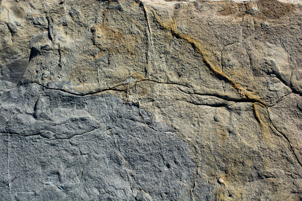 Natuursteen of Stenen oppervlak als achtergrond textuur - Foto, afbeelding