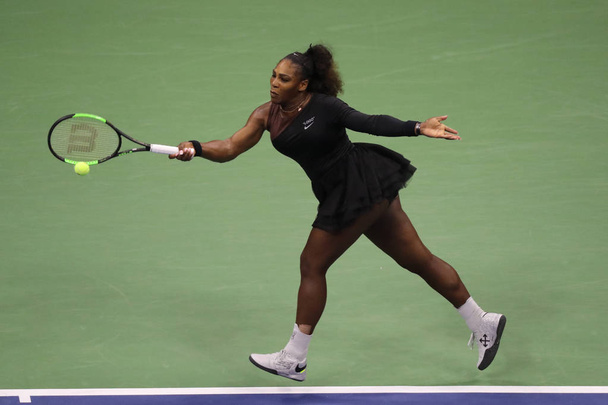 NEW YORK - SEPTEMBER 8, 2018: 23-time Grand Slam champion Serena Williams in action during her 2018 US Open final match against Naomi Osaka at Billie Jean King National Tennis Center - Photo, image