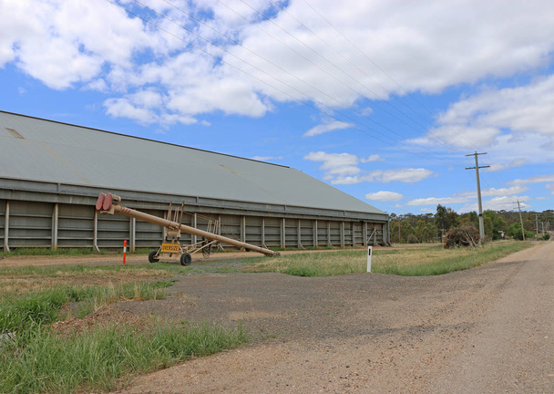 a grain shed and auger - Photo, Image
