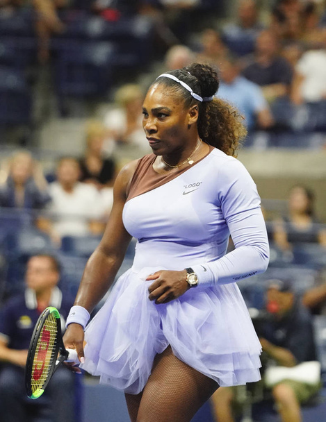 NEW YORK - SEPTEMBER 6, 2018: 23-time Grand Slam champion Serena Williams in action during her 2018 US Open semi-final match at Billie Jean King National Tennis Center - Фото, изображение
