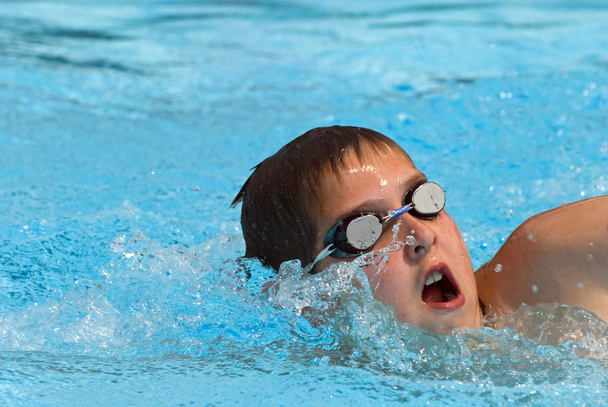 Uiminen kilpailun aikana
 - Valokuva, kuva