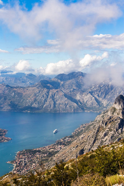 View from the mountain on a large cruise ship in the Bay of Kotor - Фото, изображение