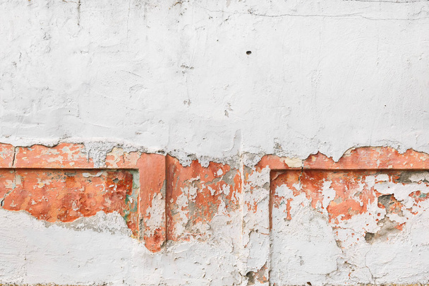 Detail of patterns and textures on cement wall . Peeling paint background. Stone damaged backdrop - 写真・画像