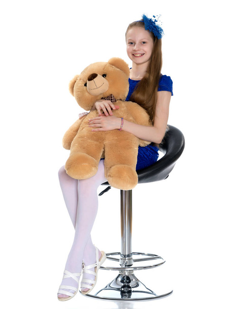 Little girl with a teddy bear. - Fotografie, Obrázek