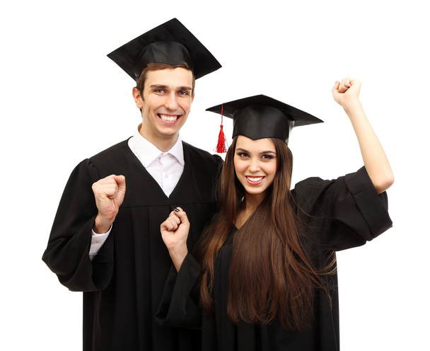 Two happy graduating students isolated on white - Photo, image