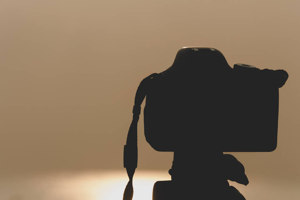 silhouette, camera and nature by the sea. - Photo, Image