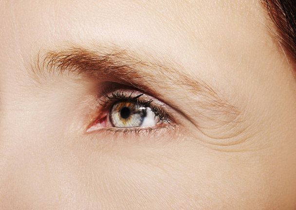 A beautiful insightful look woman's eye. Close up shot. - Photo, image