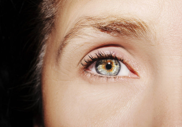 A beautiful insightful look woman's eye. Close up shot. - Zdjęcie, obraz