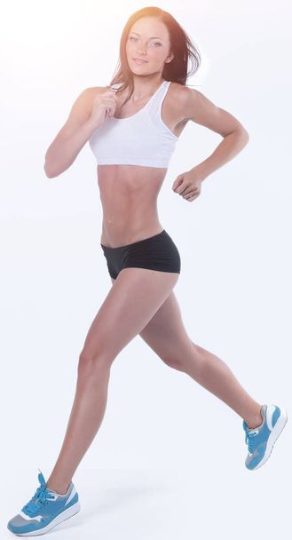 Attractive woman engaged in aerobic exercise - Photo, Image