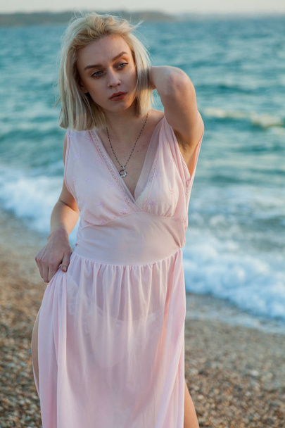 Portrait of beautiful girl in lingerie on the Beach Ocean - Fotó, kép