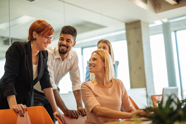 Group Of Happy Coworkers Discussing In Conference Room - Photo, Image