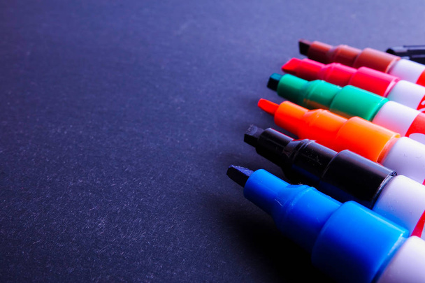 Colorful markers pens Multicolored on black background. - Photo, Image