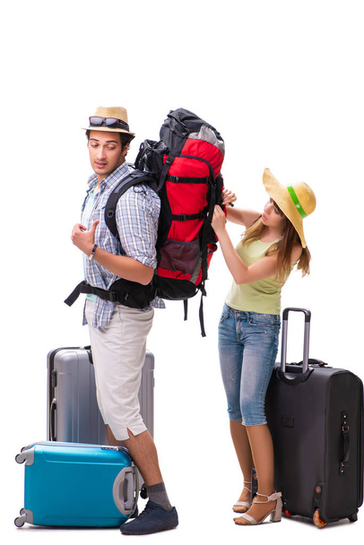 Familia joven preparándose para viajar de vacaciones en blanco - Foto, imagen