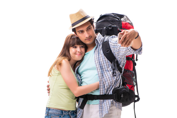 Familia joven preparándose para viajar de vacaciones en blanco - Foto, Imagen