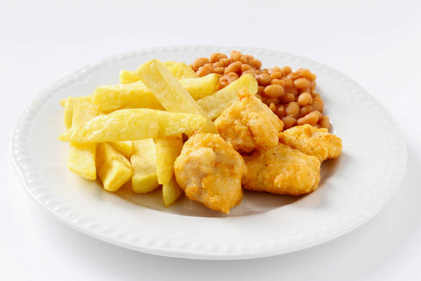 nuggets de frango com batatas fritas banhado refeição
 - Foto, Imagem